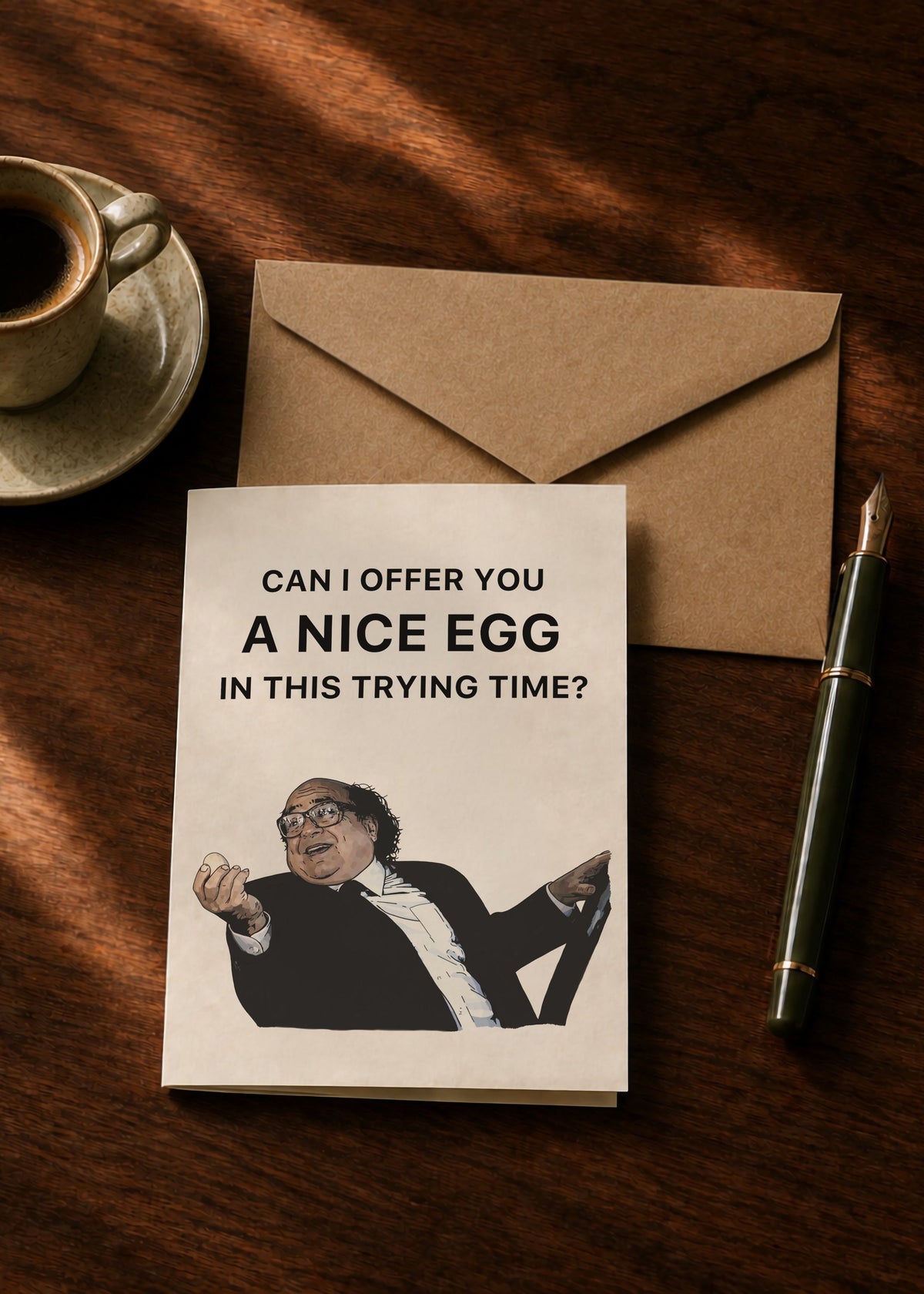 Can I Offer You a Nice Egg greeting card with kraft envelope, coffee and pen on a dark wooden table.