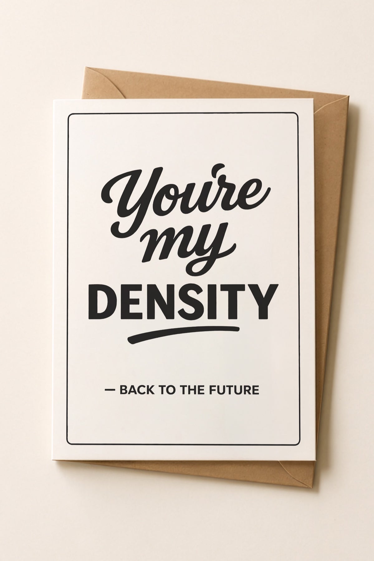 You’re My Density Back to the Future romantic greeting card with kraft envelope on a cream surface.